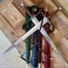 German War Sword 1 German War Sword -Tod Cutler Shop TCS13GermanWarSword HEROpileofscabbardswithcrossedswordson4