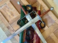 German War Sword 25 German War Sword -Tod Cutler Shop TCS13GermanWarSword pileofscabbardswithcrossedswordsonHERO3