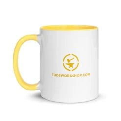 Running Viking Target - Tod's Workshop Mug -Tod Cutler Shop white ceramic mug with color inside yellow 11 oz left 65c2778864afe
